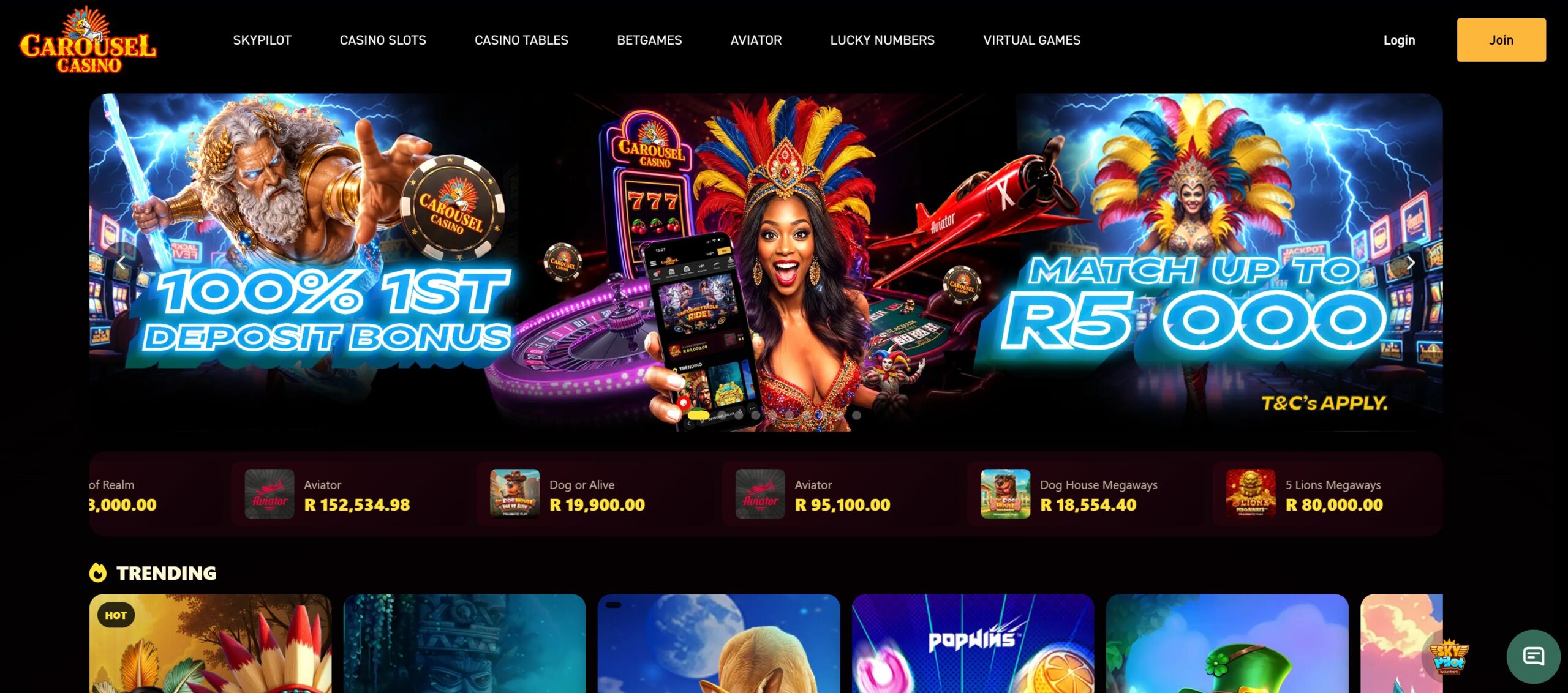 Carousel Casino home screen with promo banner, game menu and live winners ticker